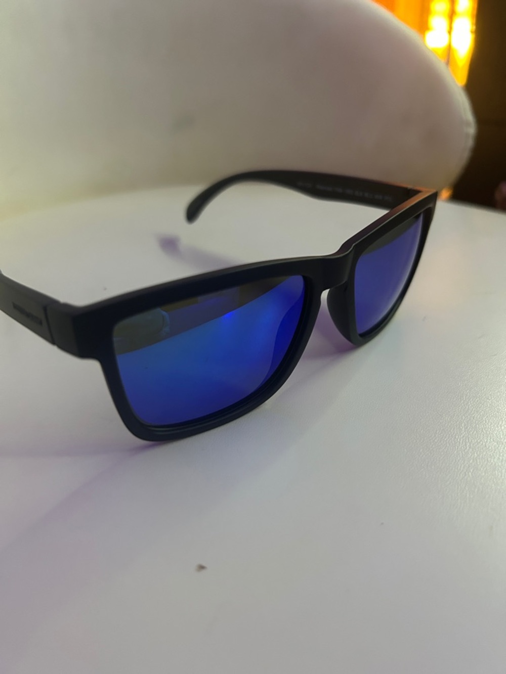 Foster Grant Matte Black Frame Sunglasses with Purple-Tinted Lenses